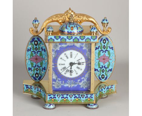 Large cloisonne brass gilded table clock with floral decoration + enamel portrait plaques on the sides.&nbsp;Mechanical, eigh