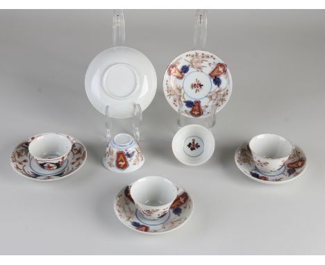 Five pieces of 18th - 19th century Imari porcelain cups and saucers with floral / gold decoration.&nbsp;Two saucers well, one