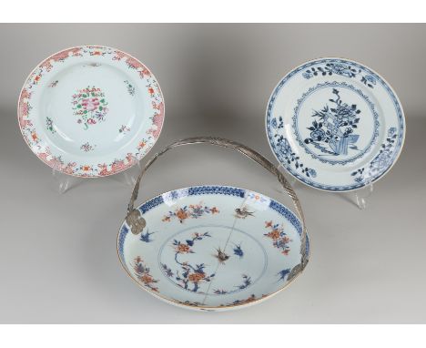 Three 18th century Chinese porcelain plates.&nbsp;(1) Rose family, floral, crisps.&nbsp;(2) Queng Lung, garden decor, hairlin