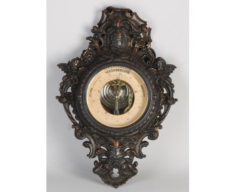 Antique German historicism composition-metal wall barometer with angels and fratz.&nbsp;Circa 1880. Dimensions: 36 x 25 x 7 c