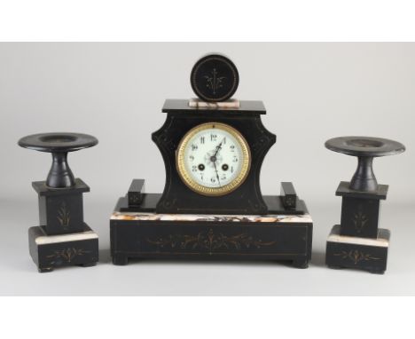 Antique three-piece black marble clock set with coupes.&nbsp;Circa 1890. Eight-day movement, half-hour strike, spring pendulu