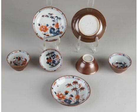 Lot of 18th century Chinese porcelain capuchine cups and saucers.&nbsp;Three saucers + four cups.&nbsp;Of which: One saucer, 