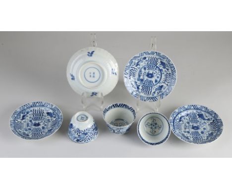 Three 18th - 19th century Chinese porcelain cups and saucers with various types of fish and crab decoration.&nbsp;With four-c