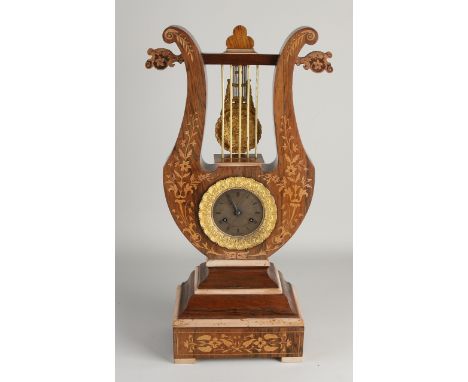 Beautiful antique French lyra mantel clock. Rosewood with intarsia, with overlying pendulum. Circa 1830. Eight-day movement, 