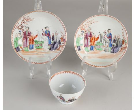 18th Century Chinese porcelain cup + two saucers with figures decor.&nbsp;Head (light) edge restoration.&nbsp;One dish good.&