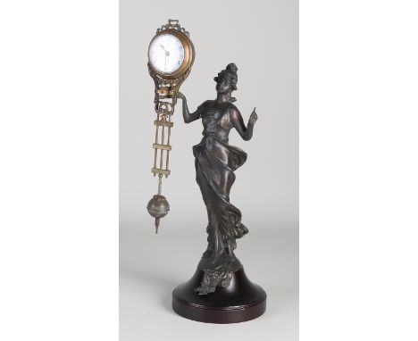 Art Nouveau style mysterious mantel clock after an old example.&nbsp;21st century.&nbsp;Dimensions: H 34 cm.&nbsp;In good con
