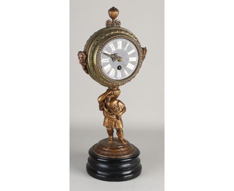 Antique German table clock with gnome and Lenzkirch movement.&nbsp;Week runner, silent timepiece.&nbsp;With wooden base, meta