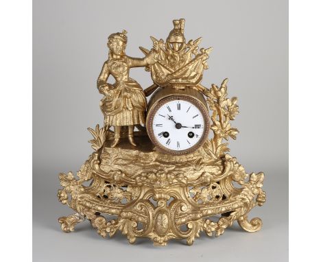 19th century gold-colored French mantel clock.&nbsp;Composition metal.&nbsp;Eight-day movement, half-hour strike, spring pend