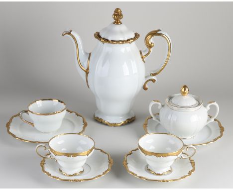 German Rosenthal porcelain partial service.&nbsp;Pompadour with gold decor.&nbsp;Consisting of: Two cups and saucers, two cak