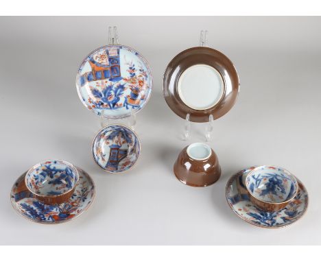 Four 18th century Chinese porcelain capuchin cups and saucers with garden / pergola / gold decoration.&nbsp;One cup glued, re