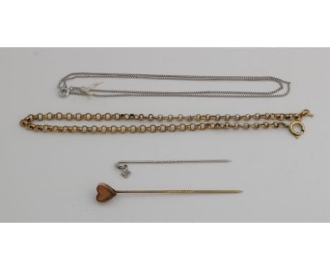 Lot of gold jewelery, 585/000, with a white gold necklace, a yellow gold piece of necklace and a white gold stick pin with a 