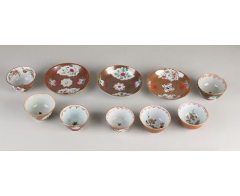 Lot of Chinese Capuchine porcelain.&nbsp;Consisting of: Seven cups + three saucers.&nbsp;Of which: two heads, hairline.&nbsp;