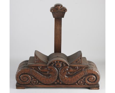19th century Dutch oak carved shaving basin holder with sea monster decor.&nbsp;Size: 13 x 45 x 45 cm.&nbsp;In good condition
