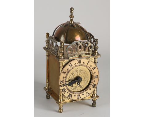 English brass Smiths mini lantern clock.&nbsp;Eight-day timepiece.&nbsp;Mechanical.&nbsp;20th century.&nbsp;Dimensions: H 18 