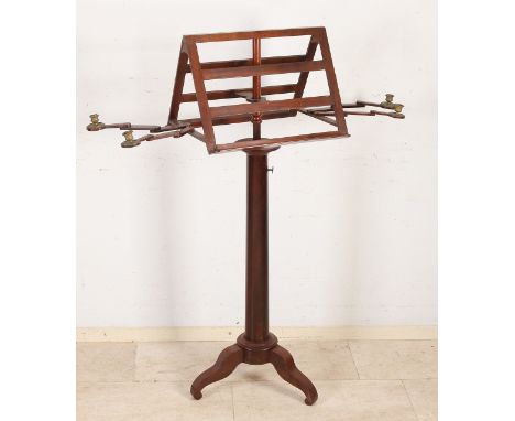 Rare early 19th century Empire music stand.&nbsp;Double sided with four gold plated brass candle holders.&nbsp;Approx. 1820. 