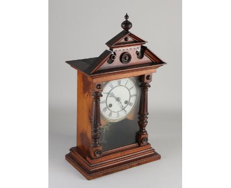 Antique German walnut Gründerzeit table clock. Circa 1900. Half hour strike on gong.&nbsp;Size: 49 cm.&nbsp;In good condition