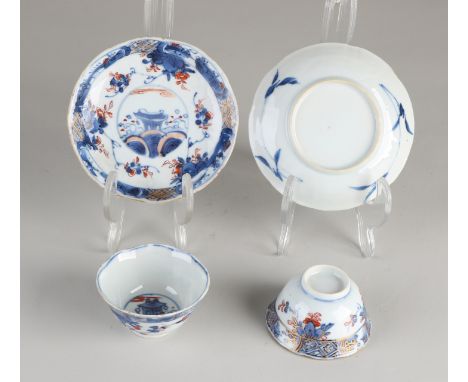 Two 18th century Chinese porcelain Imari cups and saucers with wings / pagoda in landscape decoration.&nbsp;One dish, good.&n