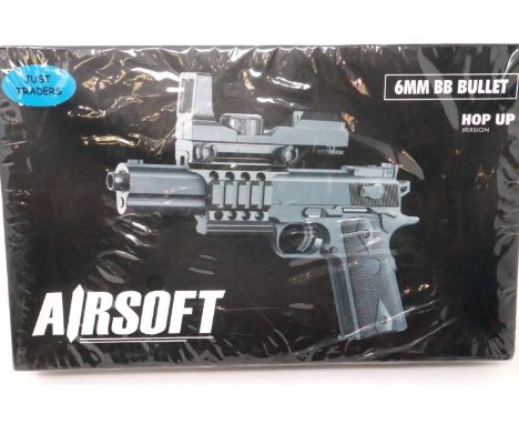 New old stock airsoft pistol, model 2123A, factory sealed. P&amp;P Group 1 (£14+VAT for the first lot and £1+VAT for subseque