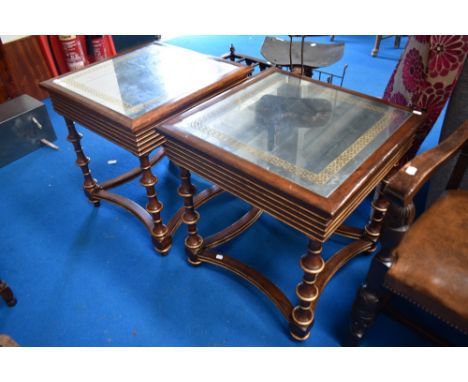 A pair of modern mirror top occasional tables