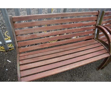 A cast iron framed railway or park style bench with arm to one side only (one of three) approx 130cm