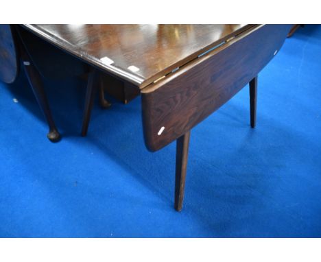A dark stained Ercol drop leaf dining table, approx 112 x 61cm (flaps down) 122cm (flaps up)