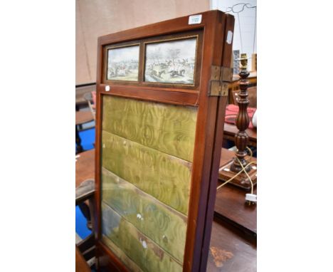 A mahogany room divider with hunting prints and glazed panels, two sections