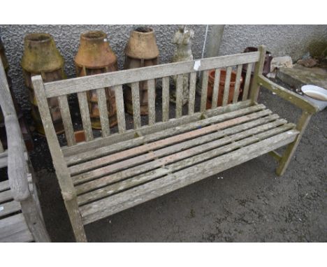 A traditional teak garden bench, approx 152cm