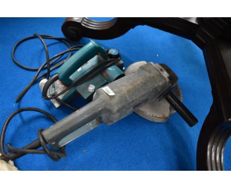 A Black and Decker angle grinder and a Makita power planer