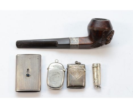 Two silver vesta cases, Chester 1905 and Birmingham 1898, a slide action Sterling Silver example, a a silver mounted pipe and