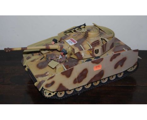 A New Millennium Toys plastic scale model of a German tank, finished in tan camouflage 