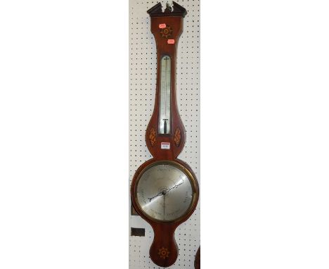 A 19th century mahogany and conch-shell satinwood inlaid two dial wheel barometer, the silvered dial signed F.Cattani Aylesbu