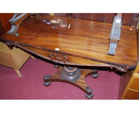 An early Victorian rosewood round cornered hall table, the frieze carved with a stag and tree in an acanthus leaf surround, r