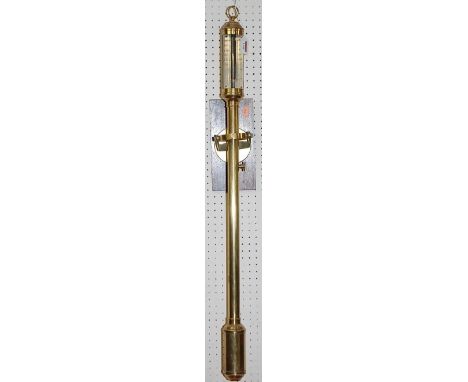 A contemporary brass gimbaled ships stick barometer, having a signed silvered scale, with integral hinged brass wall mounted 