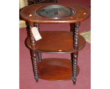 A Victorian mahogany oval three-tier wash stand, raised on bobbin turned supports (lacking ceramic bowl), width 67cm