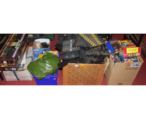 Five boxes containing a quantity of Scalextric, to include track, electronic lap-recorder etc 