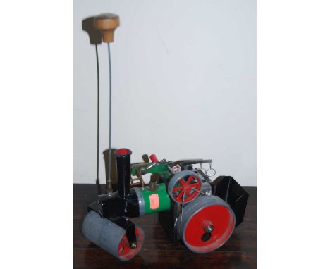 A Mamod SR1 steam roller engine, with burner, scuttle and steering rod