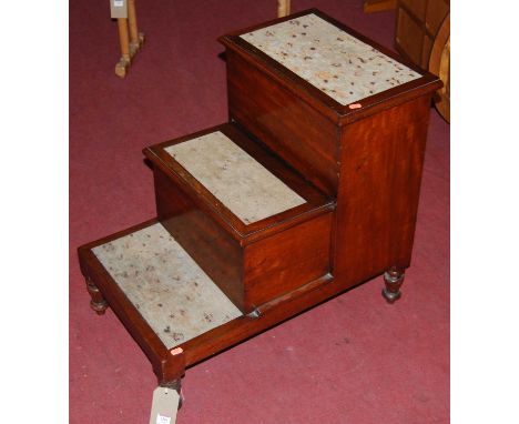 A Victorian mahogany step commode, having hinged compartments, raised on turned supports, length 71.5cm 