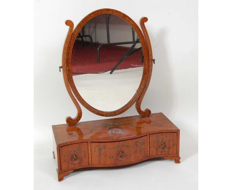 A Sheraton Revival painted satinwood dressing table mirror, the serpentine three drawer boxbase polychrome with a portrait re