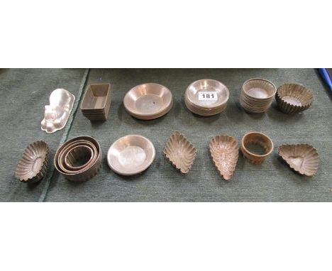 Collection of vintage cake tins, moulds, cutters etc