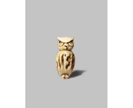 A JAPANESE ASAKUSA SCHOOL STAG ANTLER NETSUKE MEIJI 1868-1912 Depicting a small owl, the natural ridges in the material creat