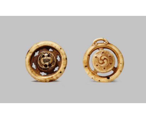 TWO JAPANESE STAG ANTLER RYUSA NETSUKE EDO/MEIJI PERIOD Both of circular form, one pierced with shaped apertures and with a c