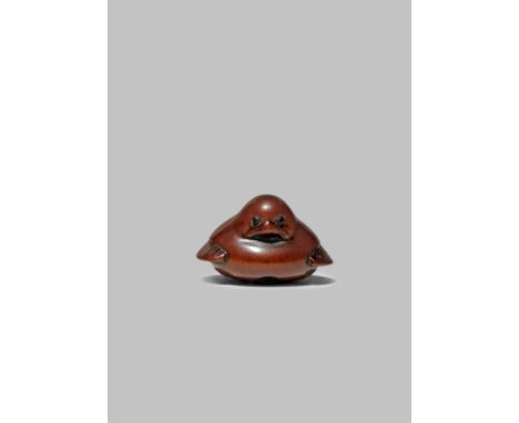 A JAPANESE WOOD NETSUKE OF FUKURA SUZUME EDO/MEIJI PERIOD The lucky sparrow depicted with a plump body and short fan-shaped w
