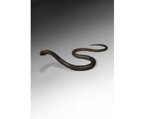 A JAPANESE MYOCHIN SCHOOL IRON ARTICULATED MODEL OF A SNAKE, JIZAI OKIMONO 19TH/20TH CENTURY Realistically modelled, the very