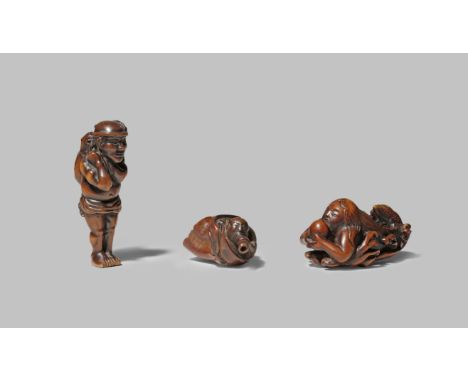 THREE JAPANESE WOOD NETSUKE EDO/MEIJI PERIODS One carved as Benkei in a large conch and blowing into a small seashell, a thre