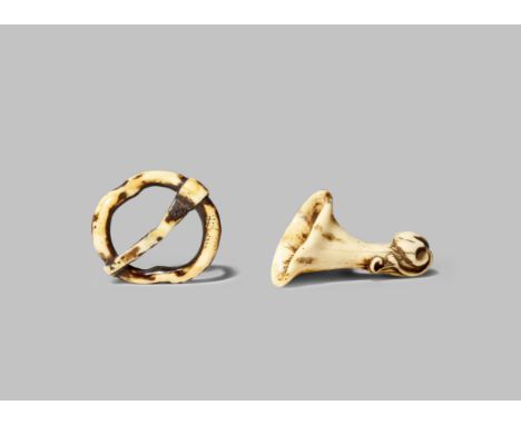 TWO JAPANESE STAG ANTLER NETSUKE EDO/MEIJI PERIODS One carved as a small mushroom with scrolling tendrils growing against the
