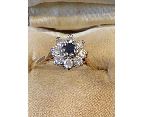 A 18ct gold Diamond and Sapphire ring size Q 