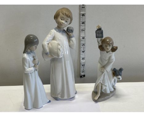 Three Nao figurines 