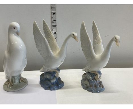 Three Nao figurines 