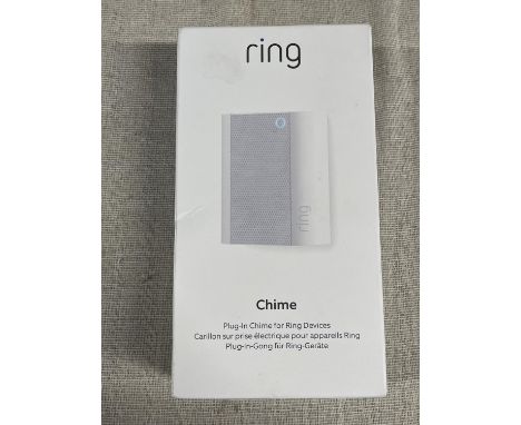A boxed and sealed Ring plug in door chime (untested) 