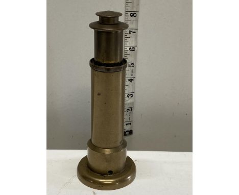 A lighthouse form trench art style heavy brass table lighter 